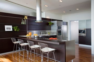 bertoia stools at counter in contemporary kitchen