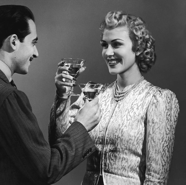 a retro image of a couple toasting cocktail glasses