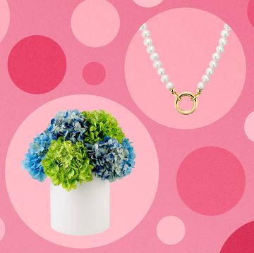 chocolates, sun dial, flower bouquet, pearl charm necklace, lenox serving platter, anniversary book