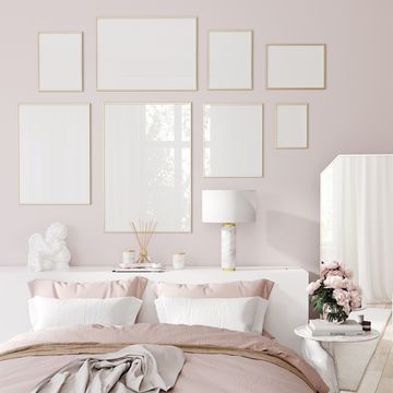 bedroom interior in pink pastel colors with a set of golden frames  3d illustration, 3d render