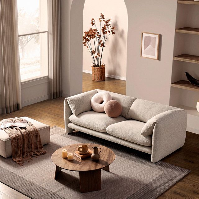 a white couch with a coffee table