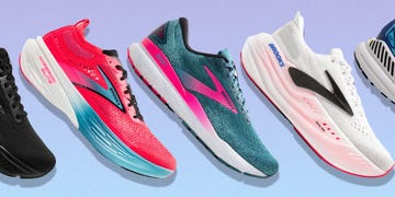 an array of brooks running shoes on a gradient purple and blue background