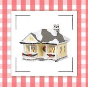 wooden tree christmas village and small yellow craftsman cottage for christmas village