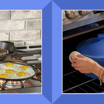two cast iron pans with steaks and eggs cooking on a stove top, and someone placing a blue pot inside of an oven