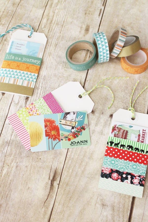 two washi tape gift card holders holding gift cards