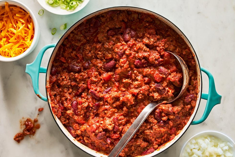 classic beef chili with sour cream and toppings
