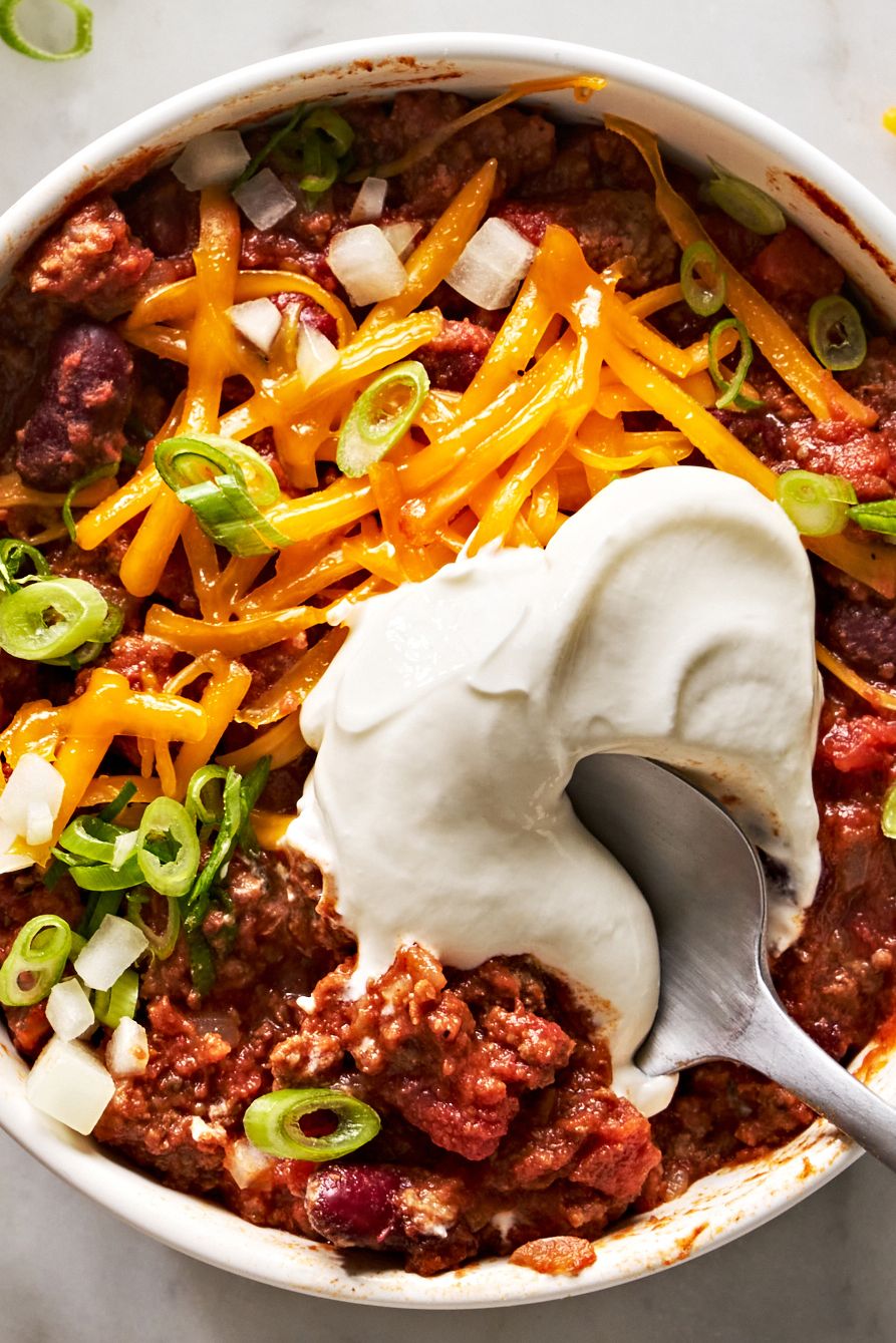 classic beef chili with sour cream and toppings
