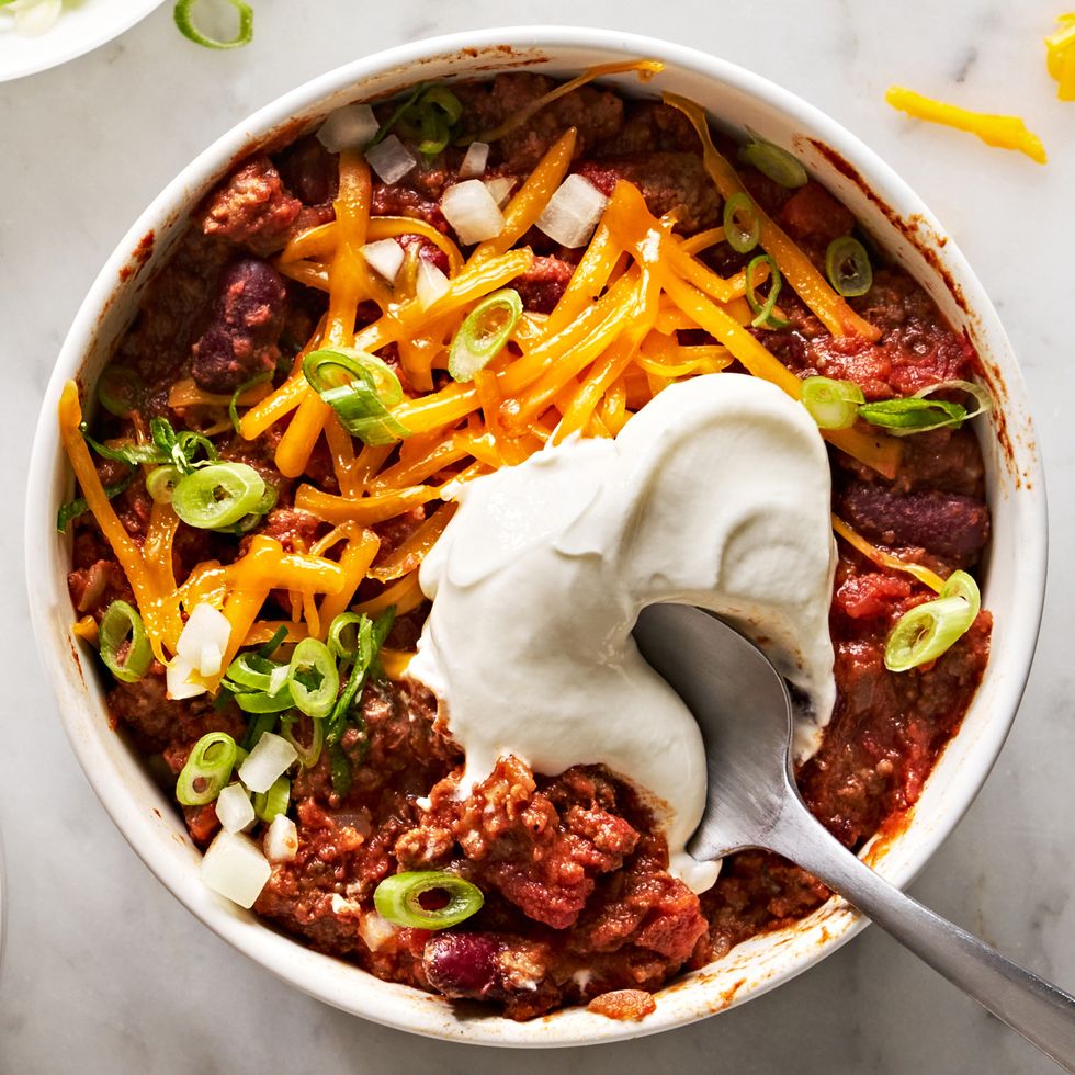 classic beef chili with sour cream and toppings