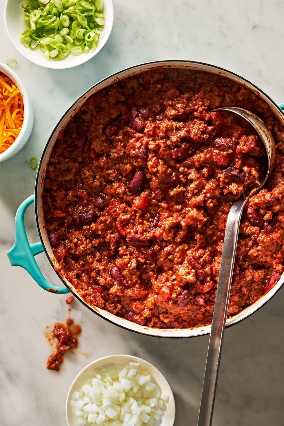 classic beef chili with sour cream and toppings