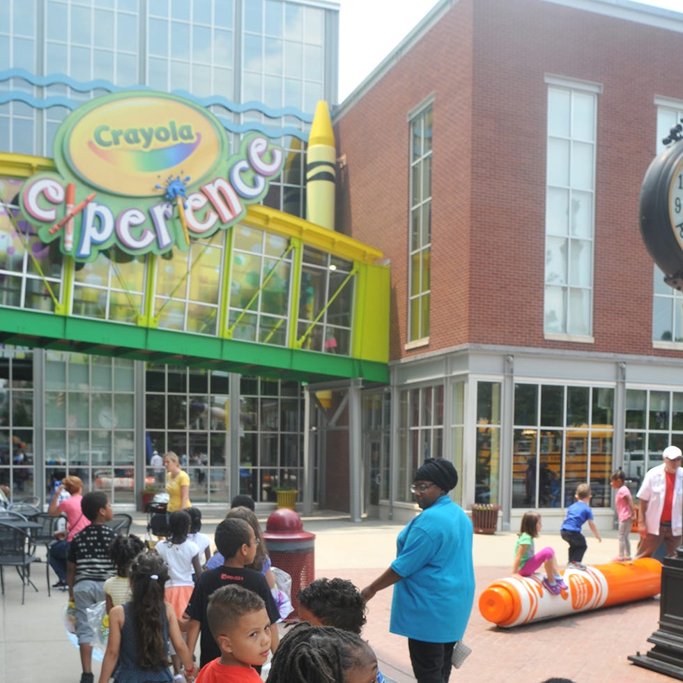 The exterior of The Crayola Experience, with a class of children heading inside. The Crayola Experience is a Good Housekeeping pick for best factory tours the exterior of the crayola experience, with a class of children heading inside the crayola experience is a good housekeeping pick for best factory tours
