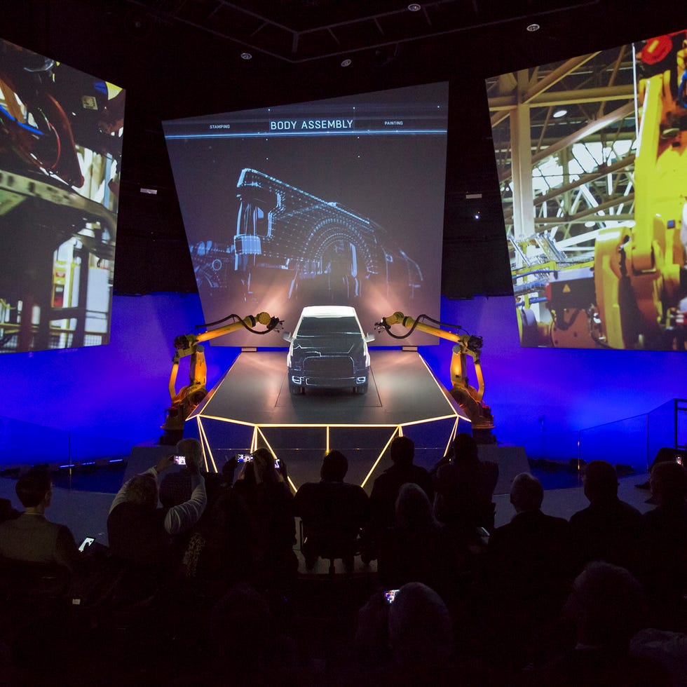 a ford f150 undergoes transformation inside the manufacturing innovation theater at the henry ford rouge factory tour, a good housekeeping pick for best factory tours