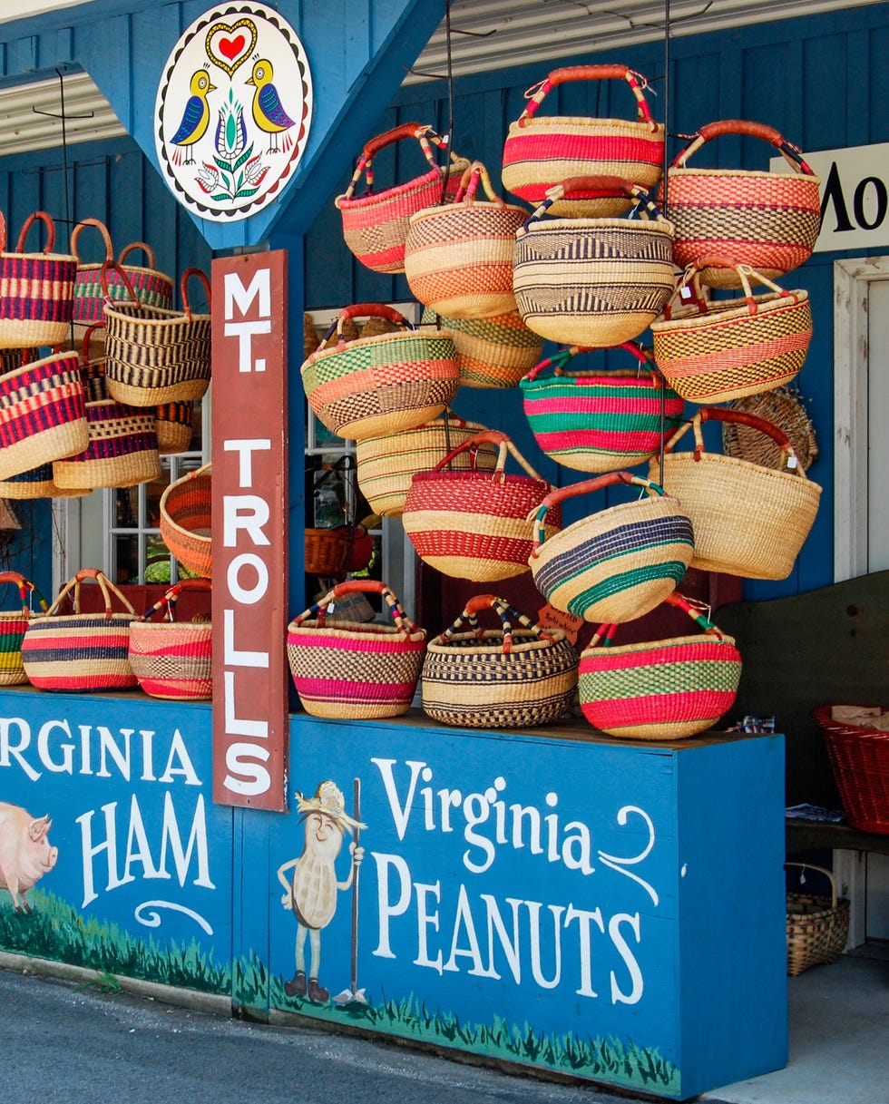 exterior of beech spring gift shop country store featuring colorful hanging baskets