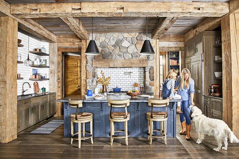 lakeside cabin home of megan and tyler duncan in bone lake, wisconsin kitchen with tons of textures   countertops, subway tile, reclaimed beams, douglas fir cabinets, and rush barstools
