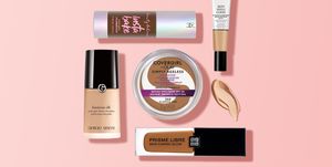 different brands and shades of makeup foundation on pink background