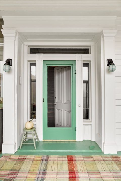 white house with jadeite green door