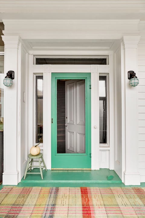 white house with jadeite green door