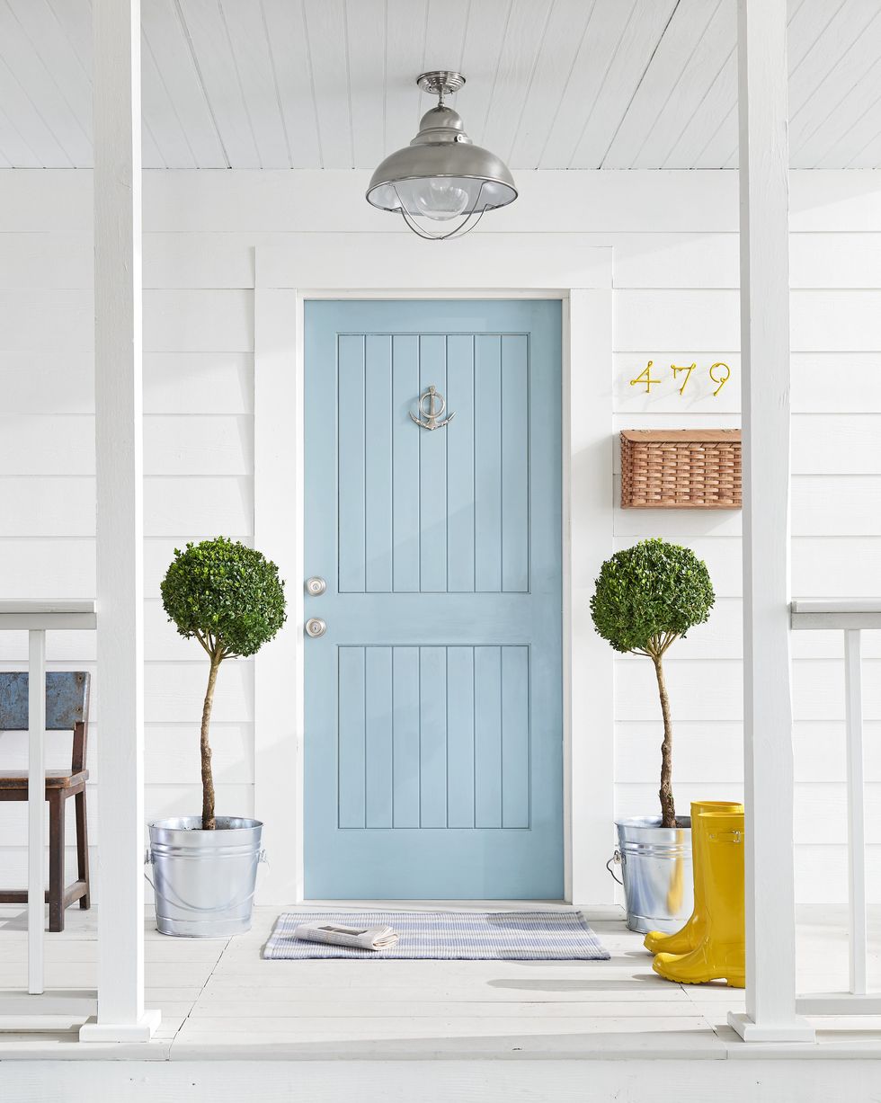 white exterior with sky blue door