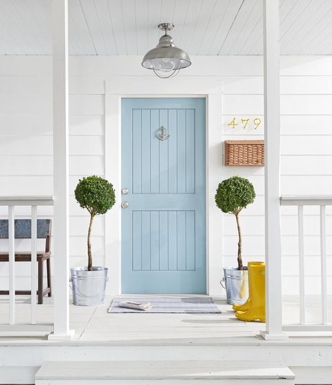 white exterior with sky blue door