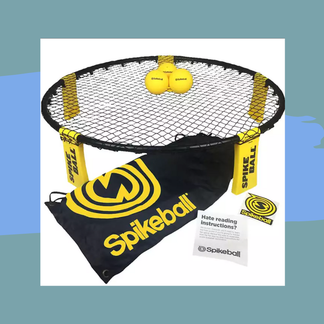 light up bluetooth speaker alarm clock next to a spikeball game set on a blue background