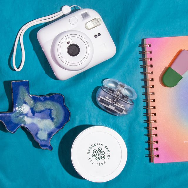 stanley cup, texas shaped spoon holder, polaroid camera, beats earbuds, planner, magnolia bakery