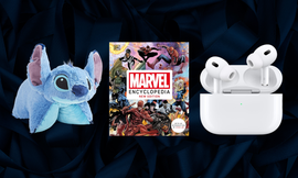 stitch stuffed animal, marvel encyclopedia and airpods on blue silk background