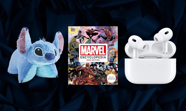 stitch stuffed animal, marvel encyclopedia and airpods on blue silk background