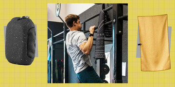 fitness scene featuring a person performing a pullup with workout accessories displayed