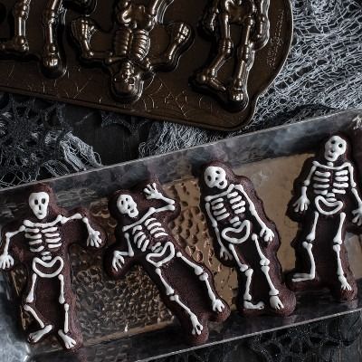  Nordic Ware Halloween Bakeware, Haunted Skull Cakelet Pan,  Bronze: Home & Kitchen