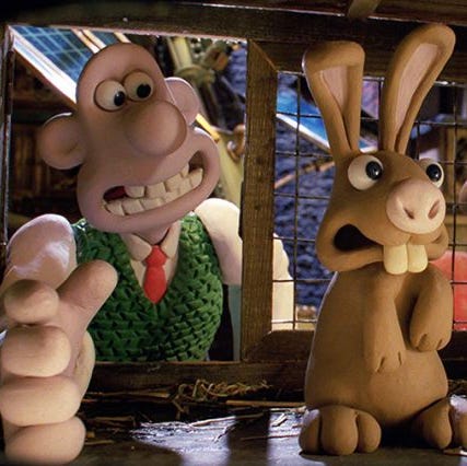 wallace grabs for a rabbit in 'wallace  gromit the curse of the wererabbit,' a good housekeeping pick for best halloween movies for kids