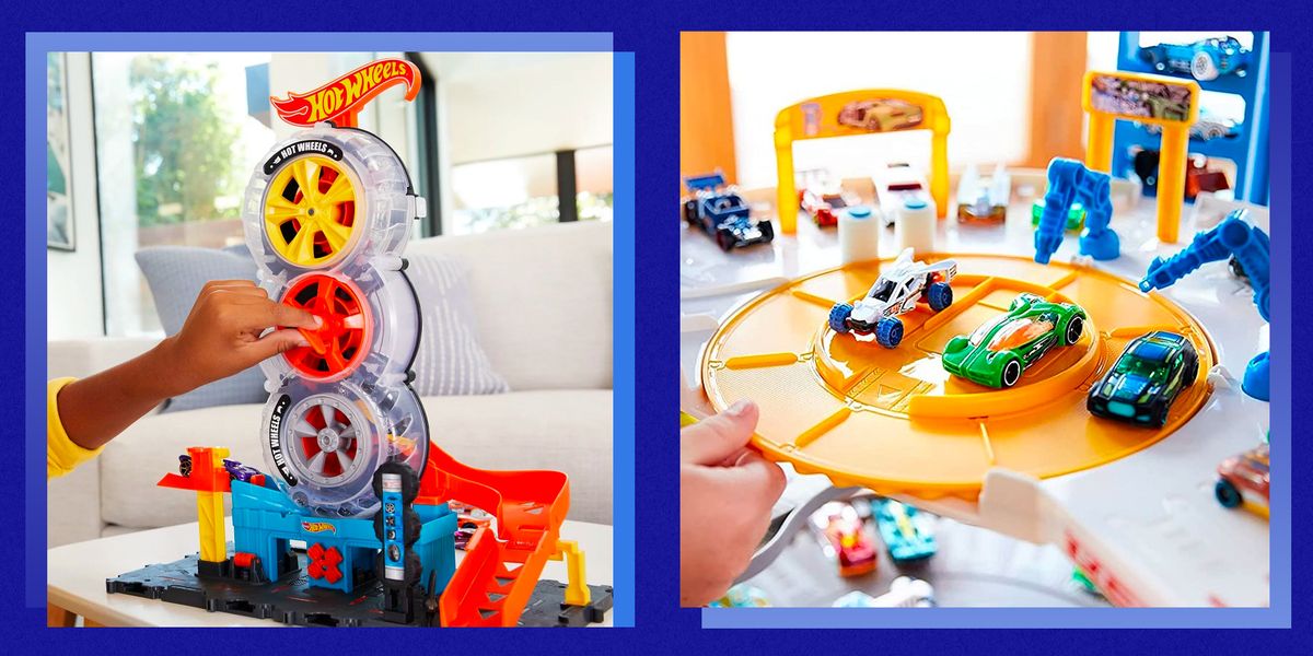 city super twist tire shop playset, and hot wheels track set with 4 toy cars, over 3 feet tall garage with motorized gorilla, storage for 140 cars, super ultimate garage ​​​​