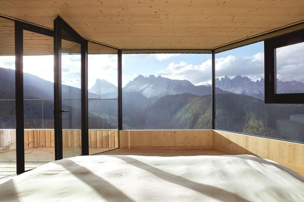 a room with a view of mountains
