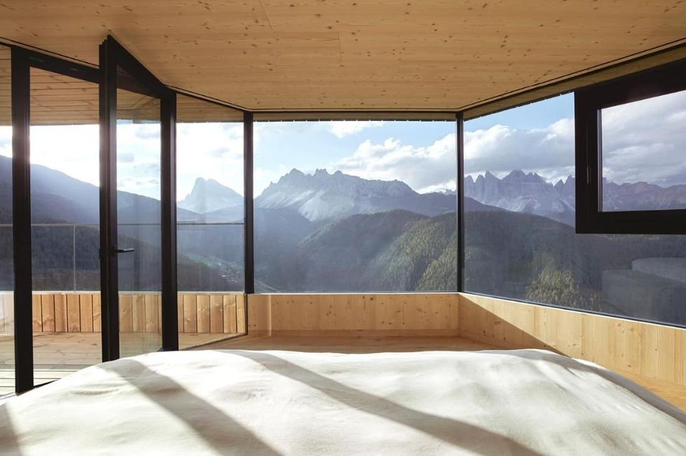 a room with a view of mountains