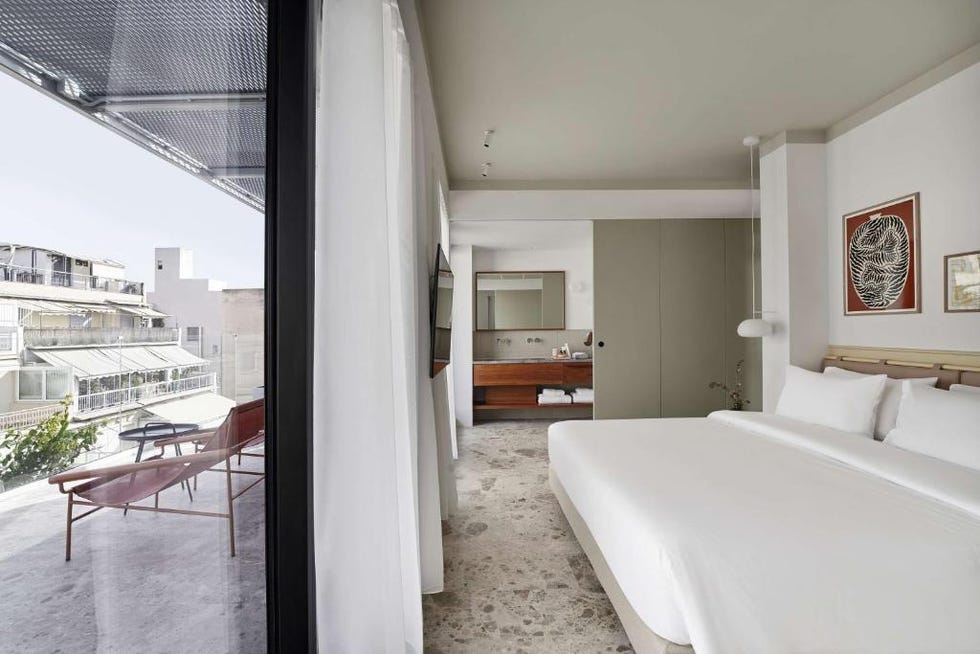 best hotels in athens a room with a bed and a table