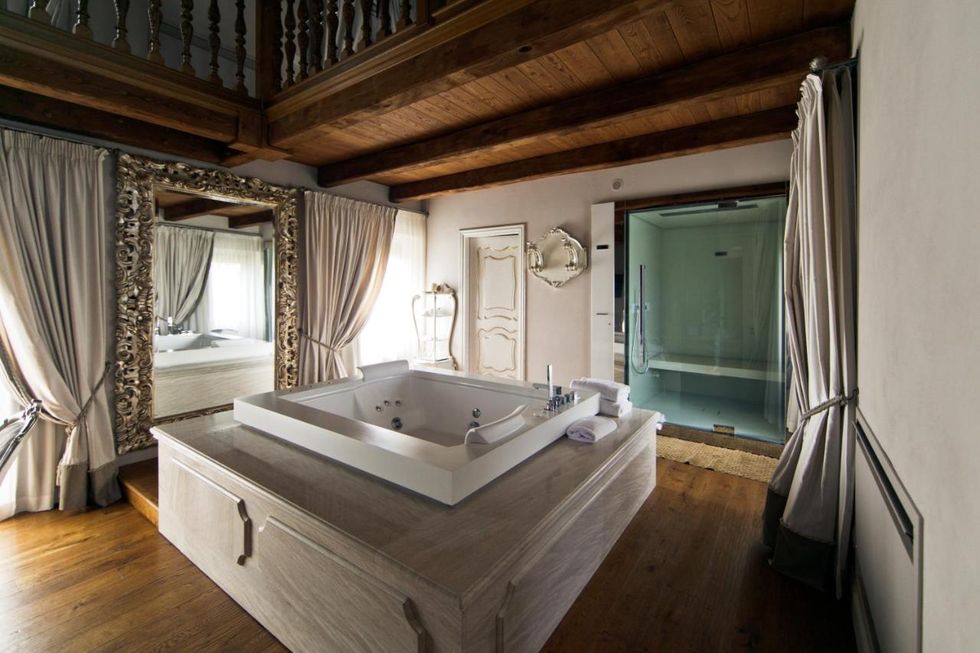a large bathroom with a large tub