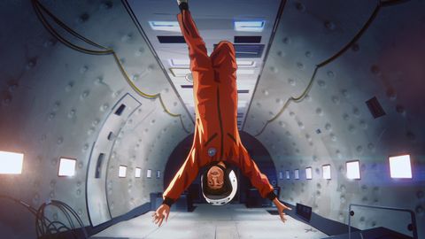 an animated astronaut floating upsidedown in apollo 10 12 a space age childhood, a good housekeeping pick for best kids movies 2022