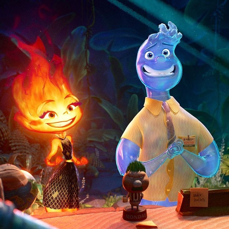 a flame and a water droplet share a moment in a scene from elemental, a good housekeeping pick for best kids movies 2023