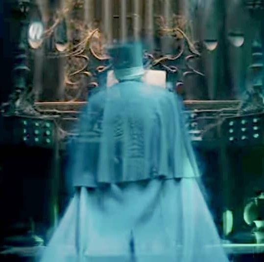 a ghost plays an organ in a scene from the haunted mansion, a good housekeeping pick for best kids' movie 2023