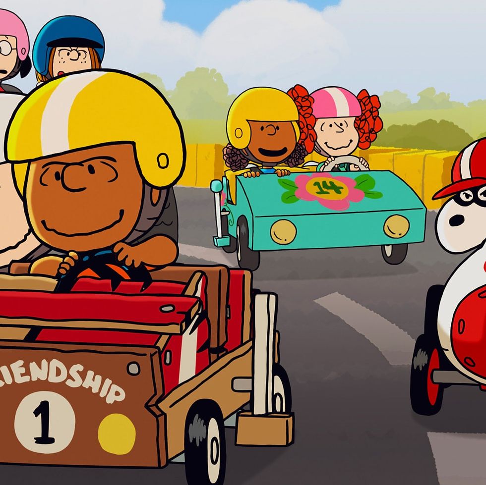 franklin and charlie brown race other kids in a homemade race car in a scene from welcome home franklin