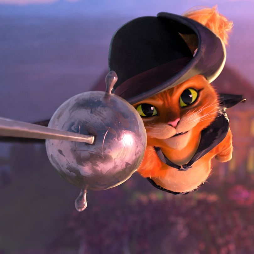puss flies through the air with his sword brandished in a scene from puss in boots the last wish