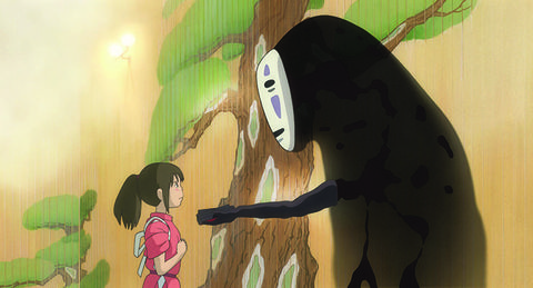 a spirit known as no face beckons to a girl named chihiro in 'spirited away,' a good housekeeping pick for best movies for kids