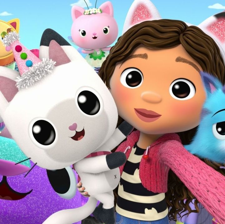 gabby holds her friend pandy and hangs with all her other cat friends in a scene from gabby's dollhouse the show is a good housekeeping pick for best kids tv shows
