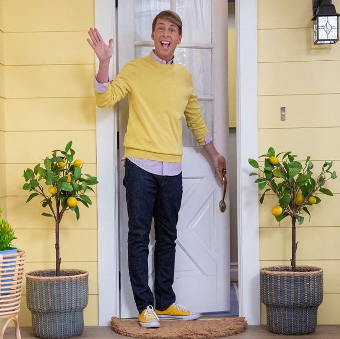 jack mcbrayer steps out a house's door and waves in an image for hello, jack the kindness show, a good housekeeping pick for best kids tv shows