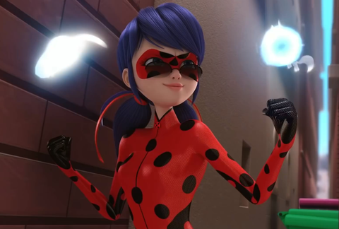 miraculous ladybug bears her fists in a scene from miraculous tales of ladybug  cat noir, a good housekeeping pick for best kids tv shows