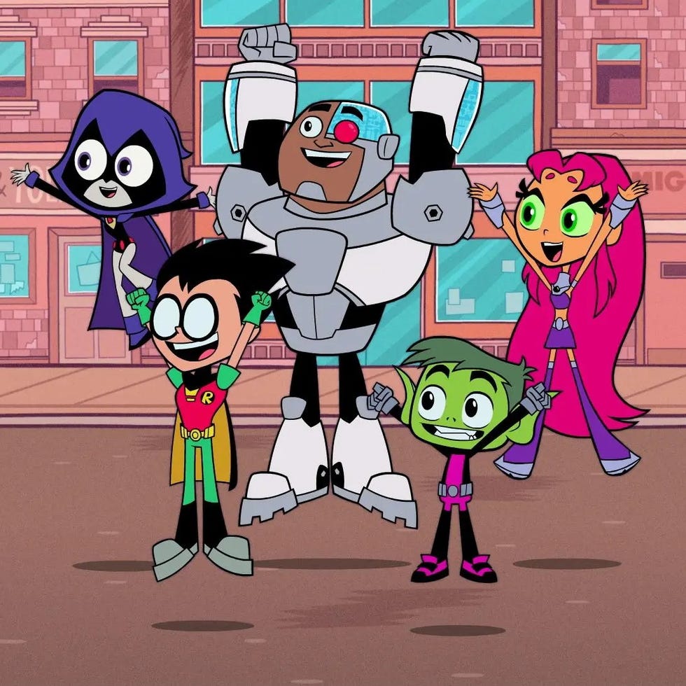 the teen titans celebrate a victory in a scene from teen titans go the show is a good housekeeping pick for best kids tv shows