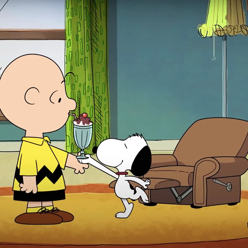snoopy hand charlie brown an ice cream sundae in a scene from the snoopy show, a good housekeeping pick for best kids tv shows