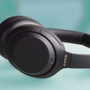 sony wh 1000xm4 noise cancelling headphones on table with phone