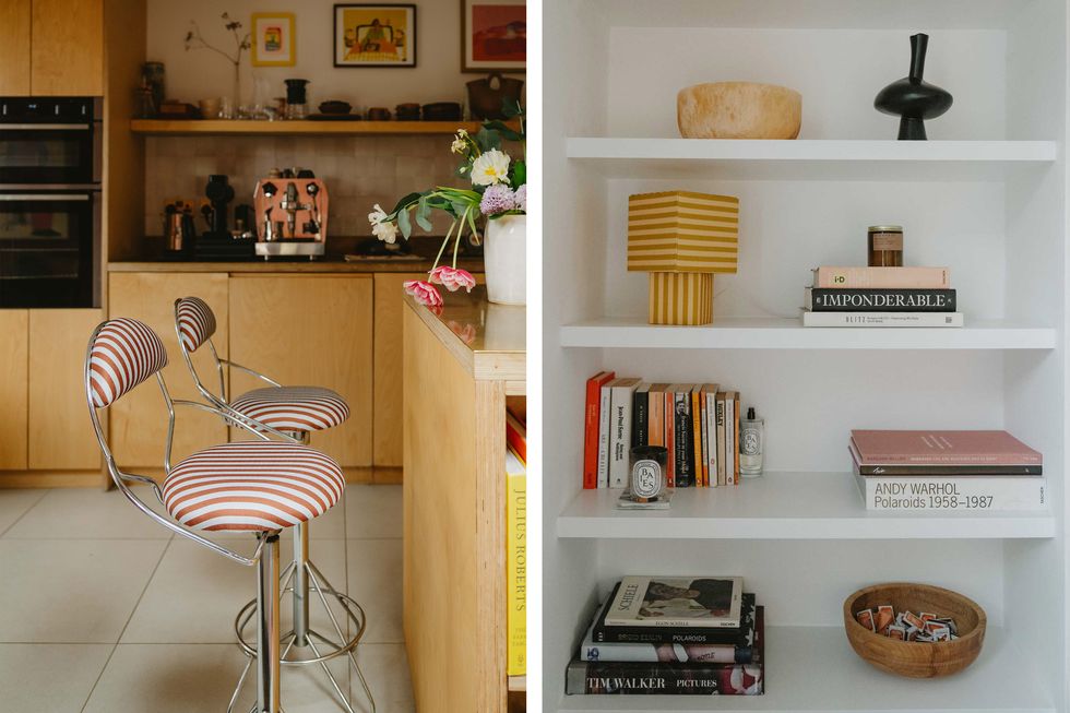 striped red bar stools and a white shelving unit with books