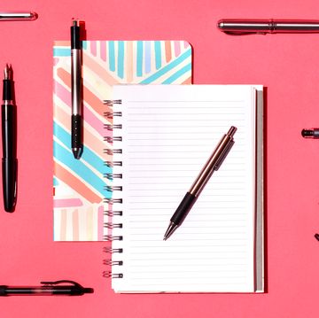 assortment of pens and notebooks