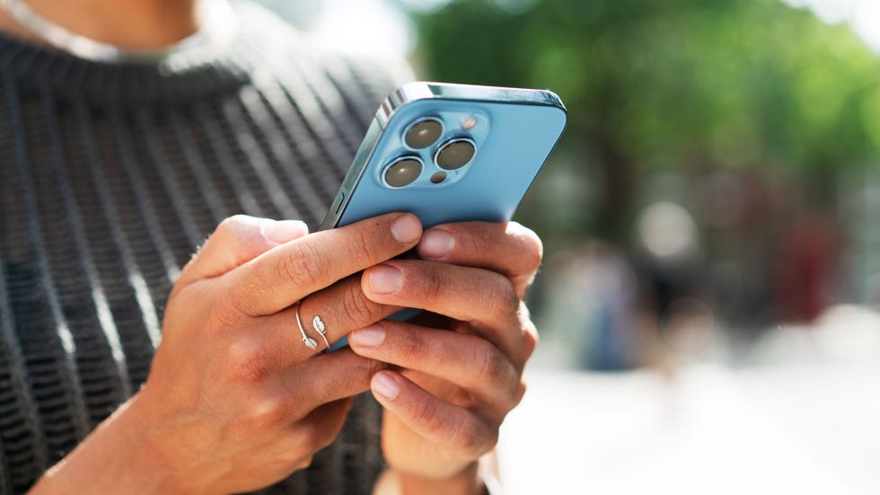 person using a smartphone outdoors