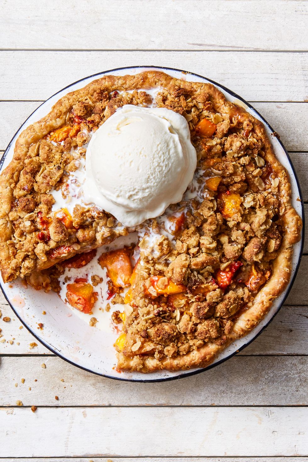 peachy pecan crumb pie with spoon